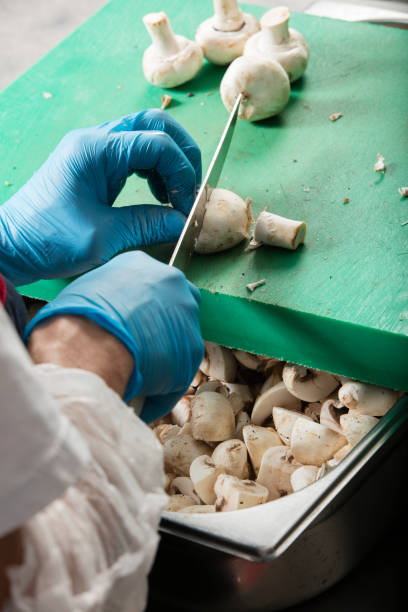 istock chef preparing food and cutting mushrooms in a restaurant kitchen 867547610