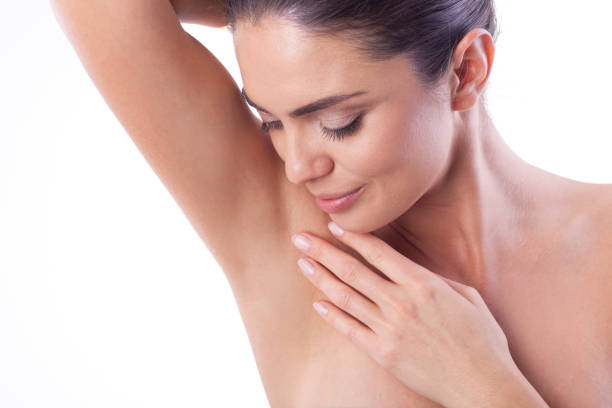 Close up of woman showing her armpit. Delicate and smooth skin on th armpit. laser stock pictures, royalty-free photos & images