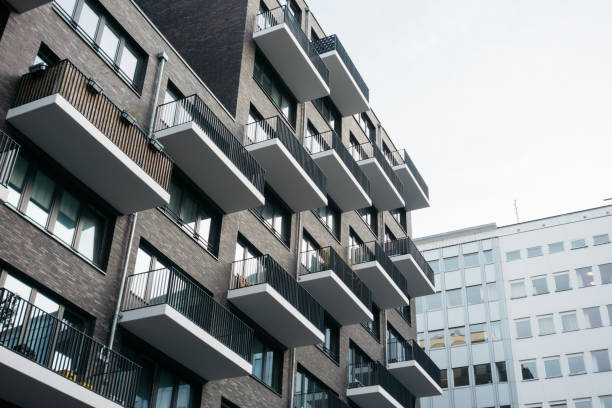 istock modern apartment building next to an office building 867556682