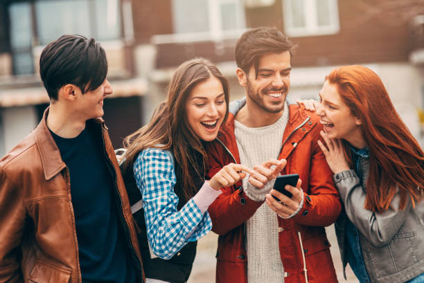 istock Friends texting in the city 867556950