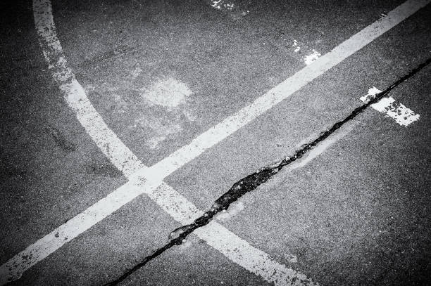 istock Sports lines worn on cracked ground 867560346