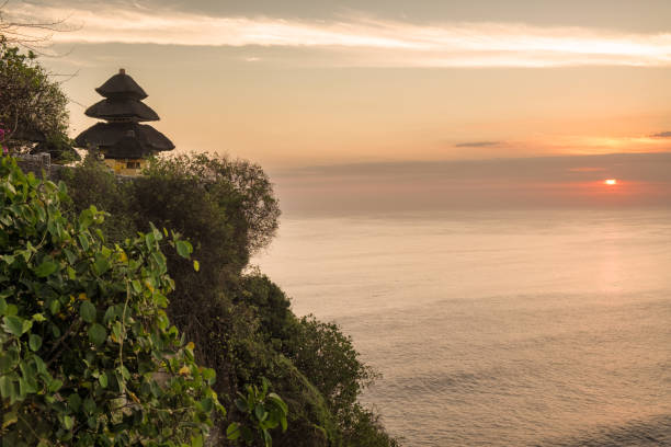istock Sunset at Uluwatu Temple in Bali, Indonesia 867565710