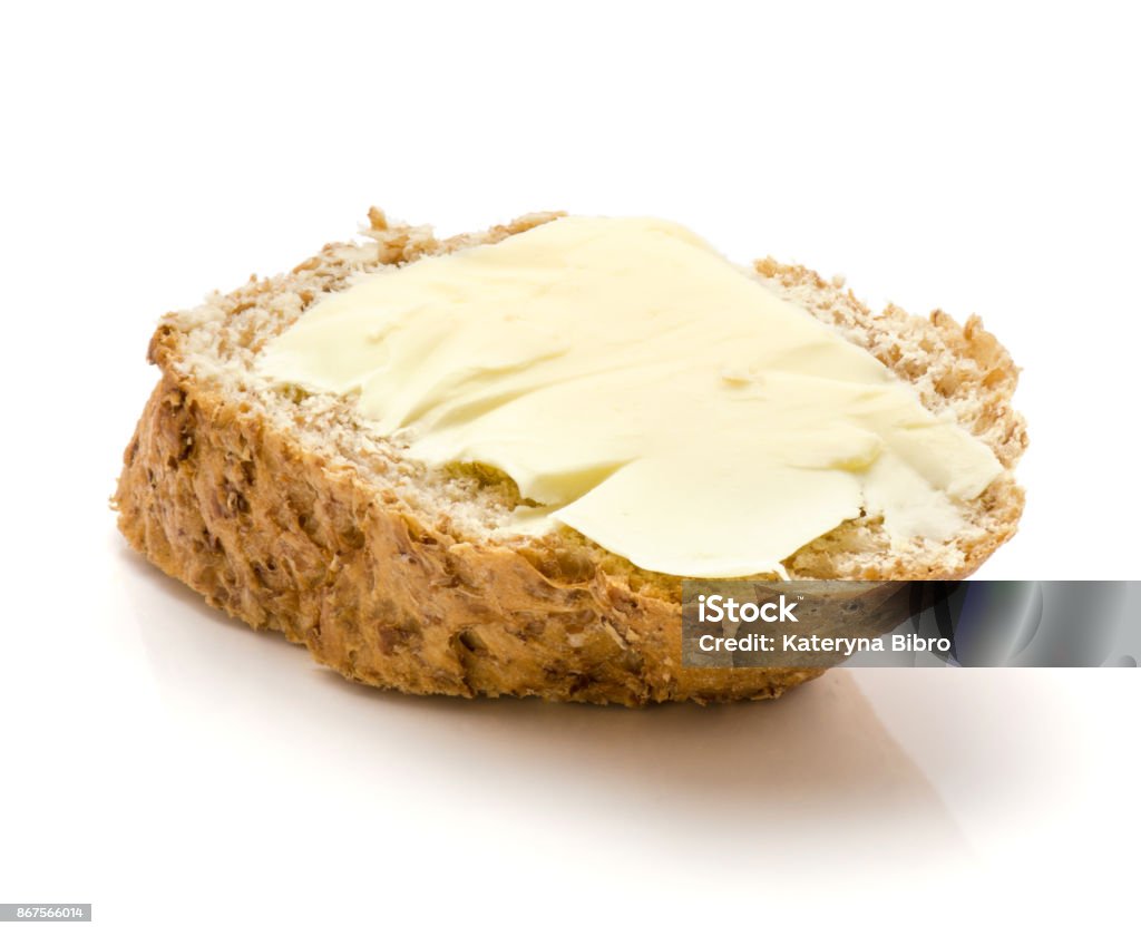 Bran bread One wheat bran bread snack with butter isolated on white background Butter Stock Photo
