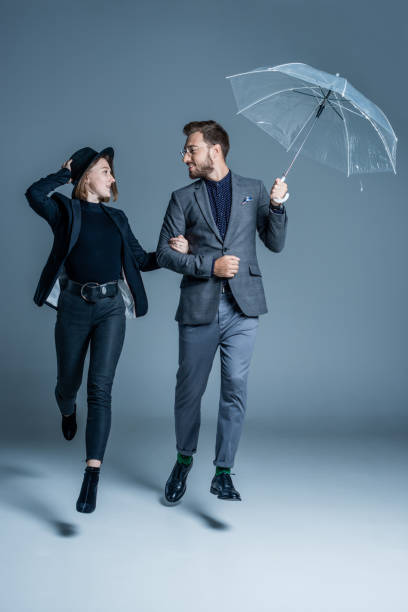 istock Man and woman walking arm in arm 867566646