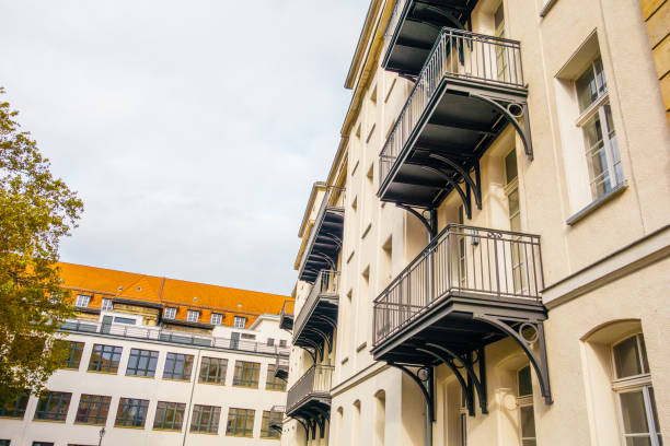 istock typical residential yellow houses in germany 867578032