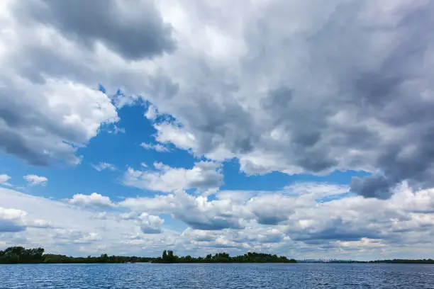Photo of beautiful clouds over the water