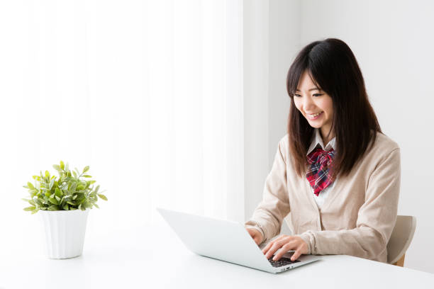 istock asian school girl studying in room 867583482