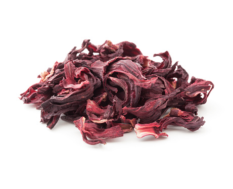 Heap of hibiscus flowers for herbal tea isolated on white background