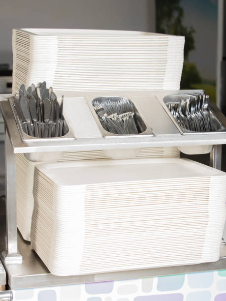 istock empty trays , forks, knife,spoon station 867614984