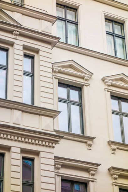 istock residential white facade with stucco 867616446