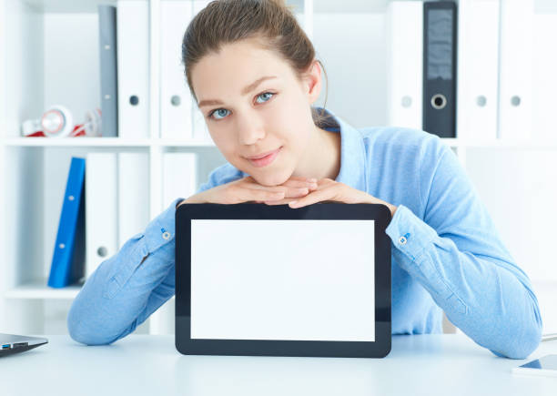 istock Business woman showing blank screen of tablet computer 867622816