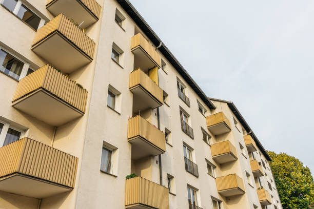 istock typical apartment house at berlin with yellow balcony 867623098