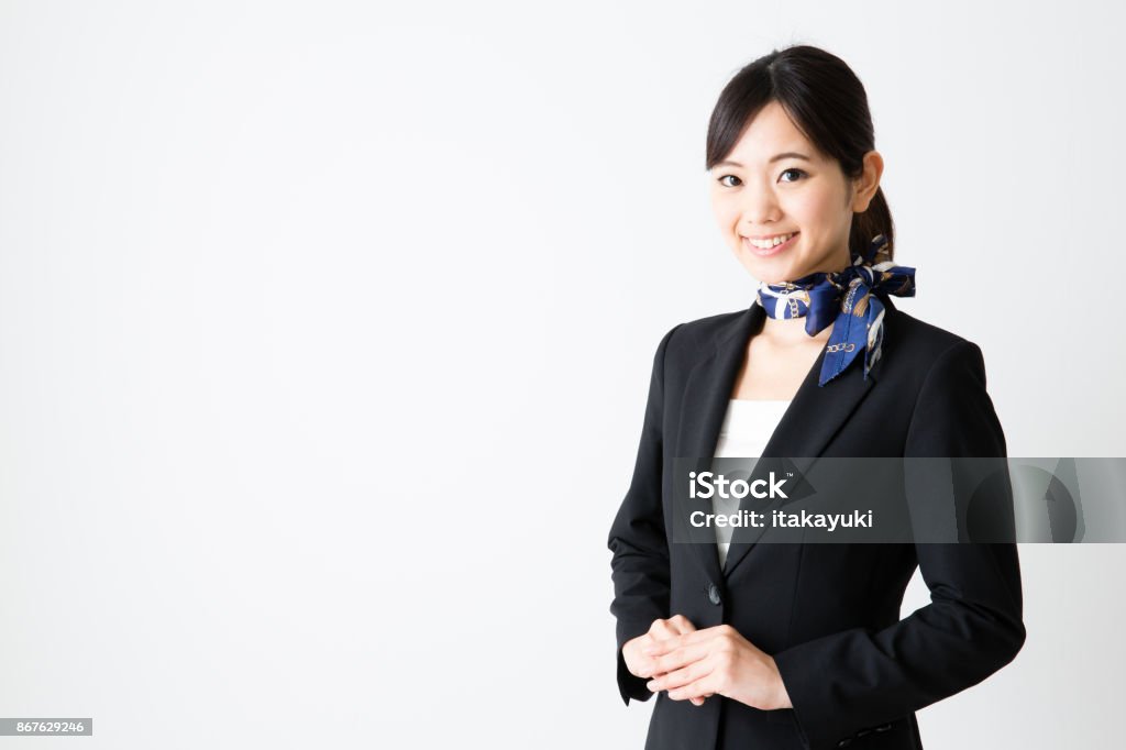 portrait of asian businesswoman isolated on wthie background Hotel Reception Stock Photo