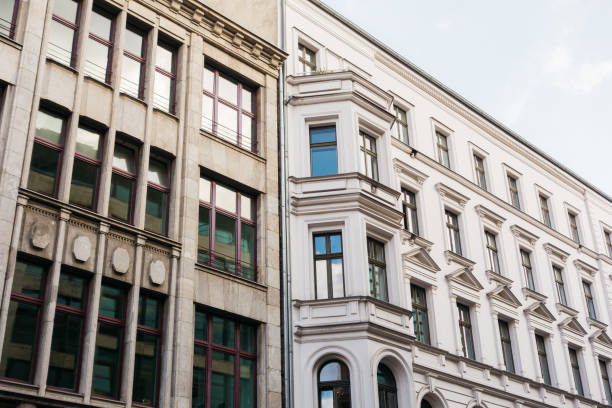 istock modern and old residential house in a row 867629418