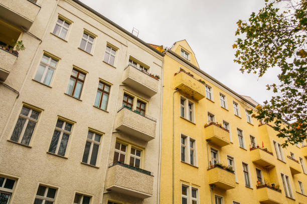 istock houses in low angle view at autumn 867629538