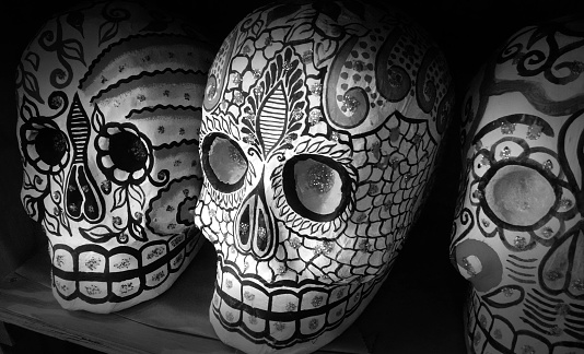 Black and white photographs of Day of the Dead Skulls at a Mexican marketplace