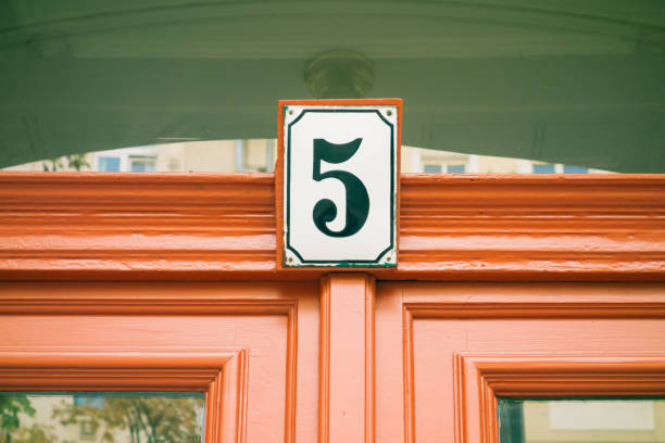 istock number 5 sign on red entrance door 867641480