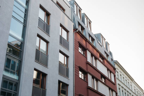istock white and red apartment houses 867648236