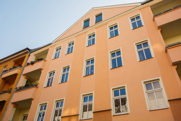 istock orange renovated apartment building 867654864