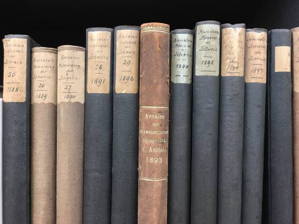istock Antique books spines pre 1900 in a row 867657424