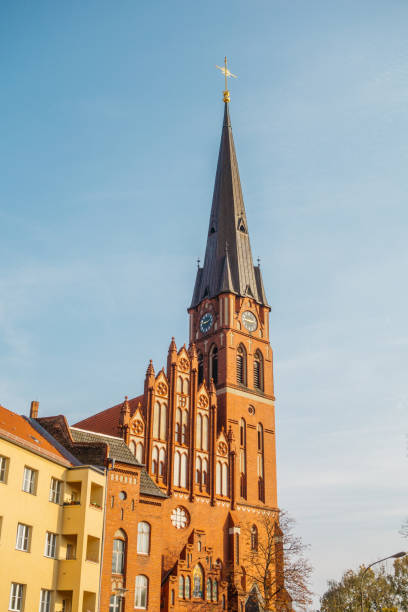 istock high format picture of clock tower from red church 867660826