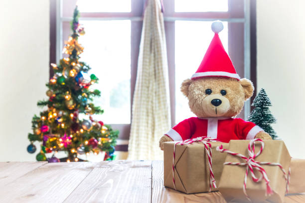 istock Teddy Bear in Santa Cross Dress 867661990