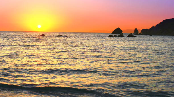 istock on the sea yet is going under the Sun. 867664828