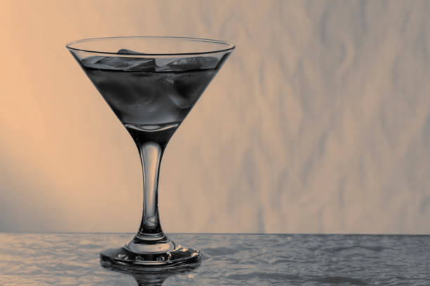 istock Cocktail with ice standing on the bar 867668168
