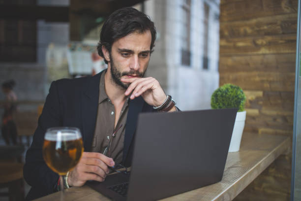 istock Charming businessman in cafe 867672472