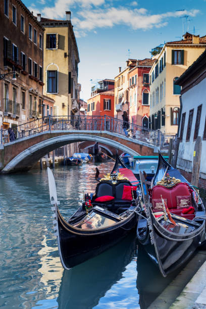 istock Gondolas on canal in Venice, Italy 867679066