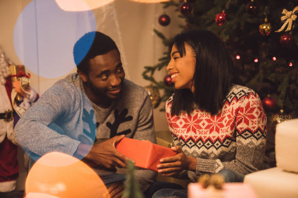 istock happy african american couple on christmas 867679736