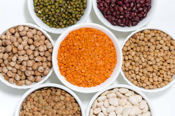 istock assortment of legumes in bowls, top view 867682530