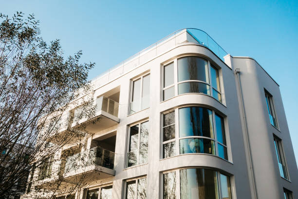 istock white apartment house with curved facade 867685752