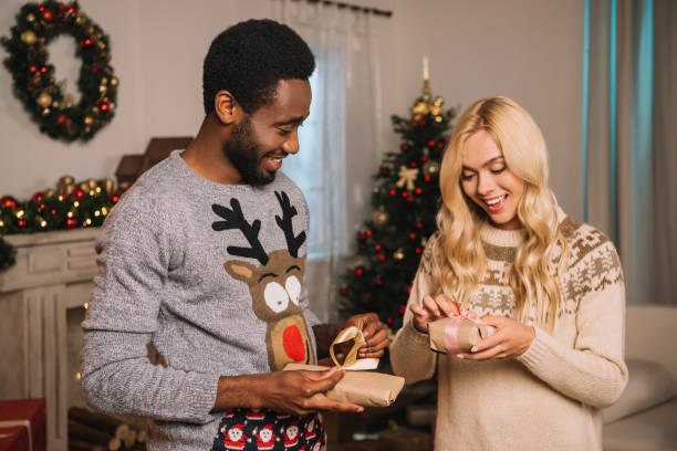 istock multiethnic couple on christmas eve 867689024