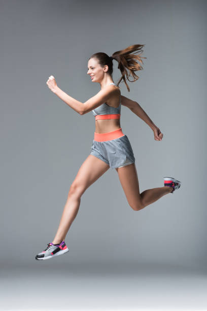istock young sportswoman jogging 867689530