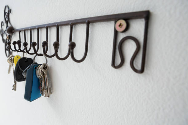 istock Close-up of various keys hanging on hook 867692688
