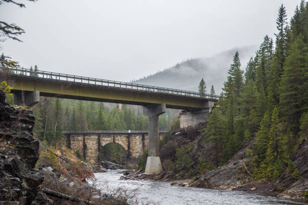 istock A beautiful historic stone bridge crossing the river in central Norway. 867692756