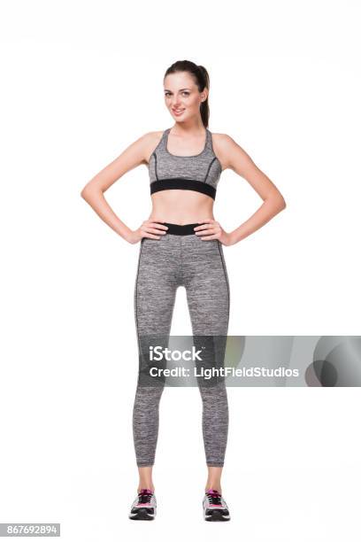 Happy Sportswoman With Hands On Waist Stock Photo - Download Image Now - Adult, Adults Only, Arms Akimbo