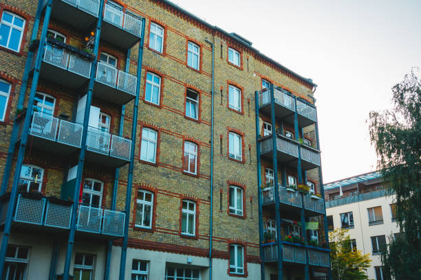 istock old renovated brick apartment building 867696556