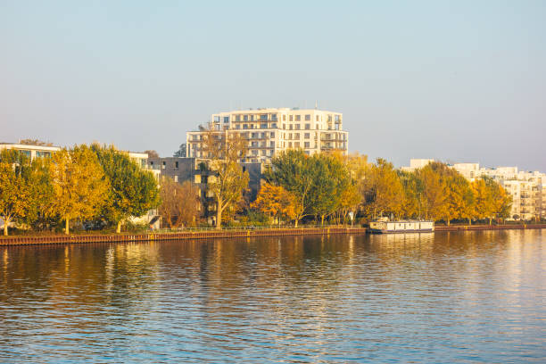 istock modern apartment houses at spree river in autumn 867697214
