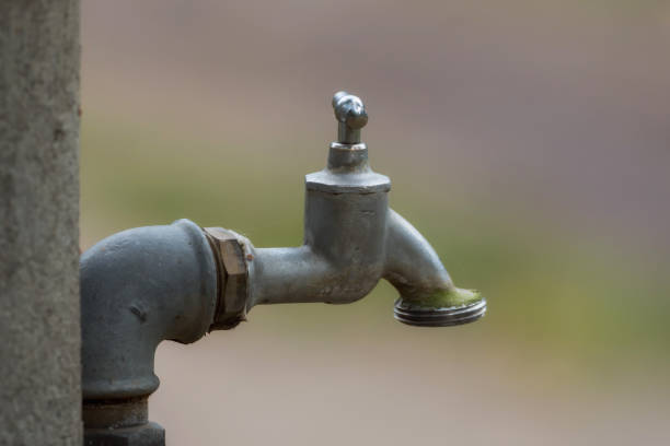 istock Simple water faucet with soft background 867697900