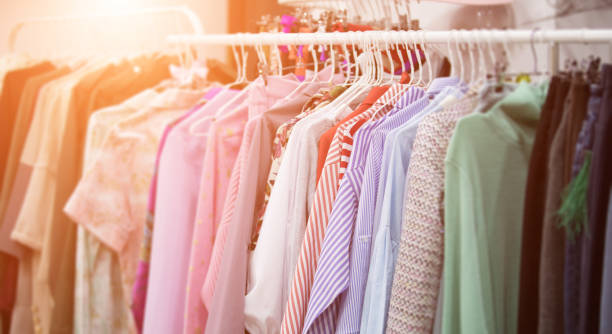 istock Clothes on hangers in store 867703328