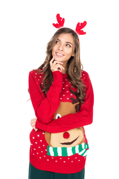 istock woman in winter festive sweater 867703874