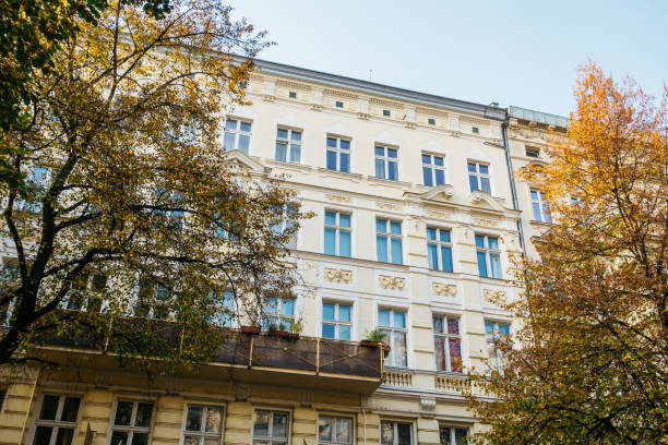 istock yellow facaded apartment complex in autumn 867704264