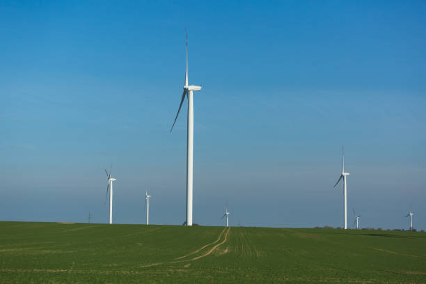 istock Wind generator on a background of sunset sky. Clean energy concept 867707568