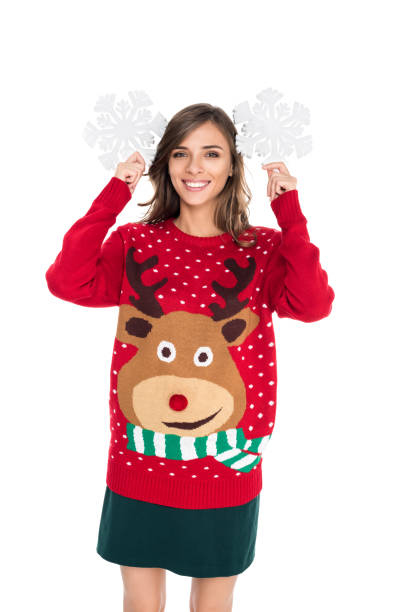 istock woman holding snowflakes 867708134