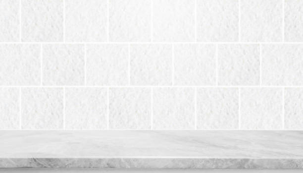 istock Stone table top and background of grey granite stone tile wall - can used for display or montage your products. 867717290