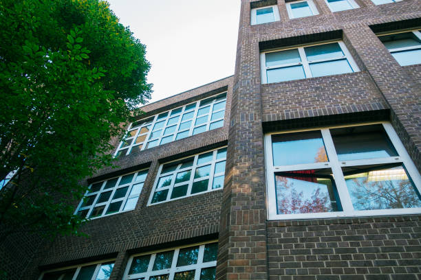istock dark facaded brick building for office or apartment 867717592