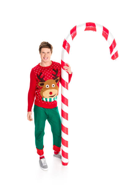 istock man with christmas decorative lollipop 867719974