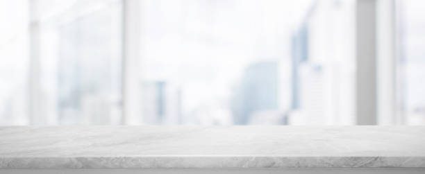 istock White Stone table top and blur glass window wall building banner background with vintage filter - can used for display or montage your products. 867720458